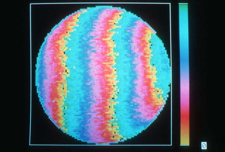 Scientists have long been aware of oscillations in the photosphere (sun's surface). These oscillations can be measured in wavelengths of light (Doppler shifts). A Fourier tachometer was developed in the 1980s by Timothy Brown of the High Altitude Observatory in order to measure these Doppler shifts. The bands in this image denote changes in velocity, or oscillations, produced by the sun's rotation. Data from the oscillating Doppler shifts provide clues to the sun's temperature, composition, rotation, flows, and magnetic field strength.