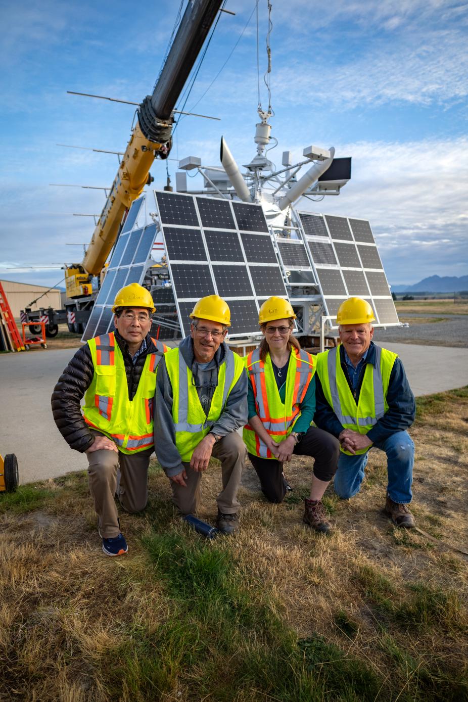 HiWind team posing in front of gondola.